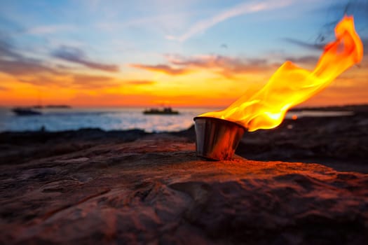 Ibiza fire at sunset in sant antonio de Portmany at Balearic islands