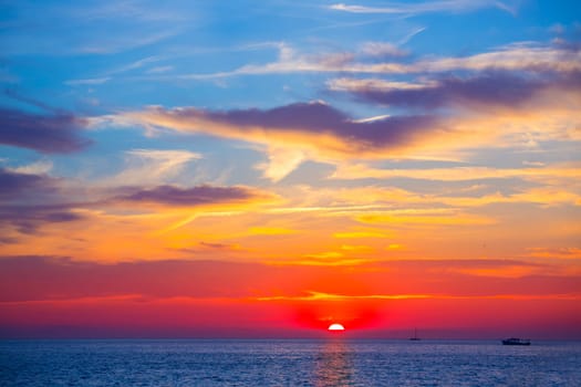 Ibiza San Antonio magic sunset red sky clouds in Balearic islands spain