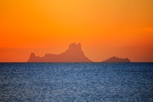 Ibiza sunset Es Vedra view from Formentera la Savina red orange sky