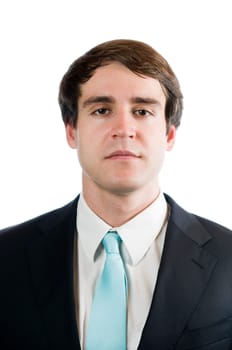 Head-and-shoulder portrait of a young man in a black suit and light blue ties looking into the camera against a white background