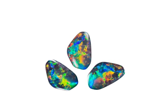 Three opals with a complete colour spectrum