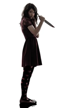 one caucasian strange young woman killer holding  bloody knife in silhouette white background