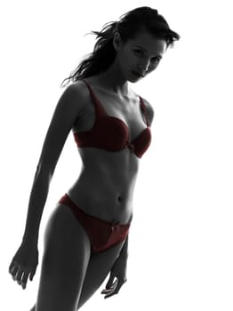 one beautiful asian woman  in red underwear  silhouette studio isolated on white background