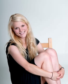 happy young woman on chair