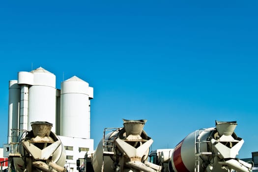 Concrete mixers waiting for cargo