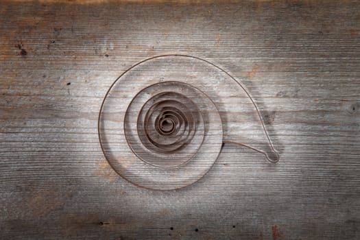 clock spring on oldwooden background