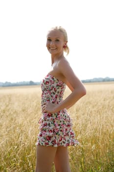 Young woman in cornfield