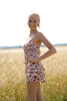 Young woman in the cornfield