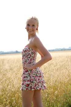 Young woman in the cornfield