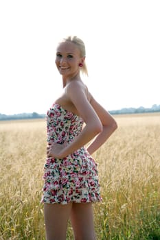 Young woman in the cornfield