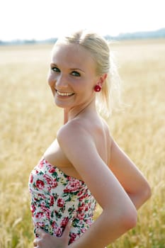 Young woman in the cornfield