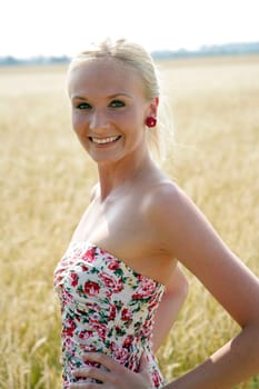 Young woman in the cornfield