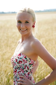 Young woman in the cornfield