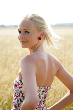 Young woman in the cornfield