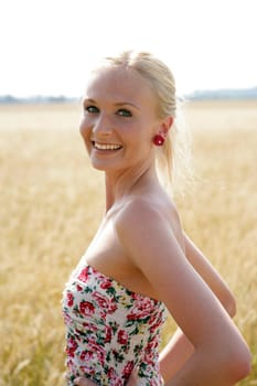 Young woman in the cornfield
