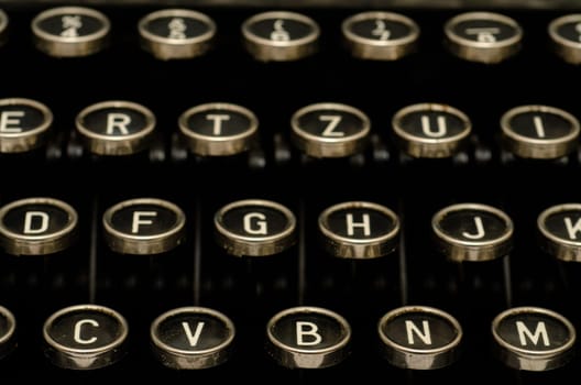 Close-up of letters on a typewriter keyboard
