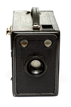 Old black box camera made of sheet metal on a white background