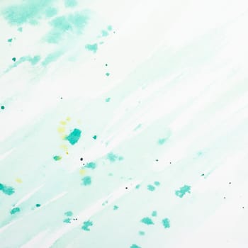 Watercolor in turquoise with yellow splashes as background