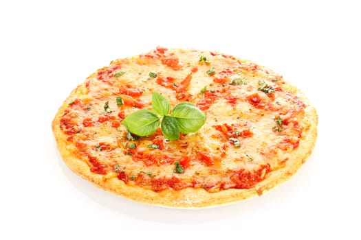 Pizza Margherita decorated with basil leafs isolated on white background