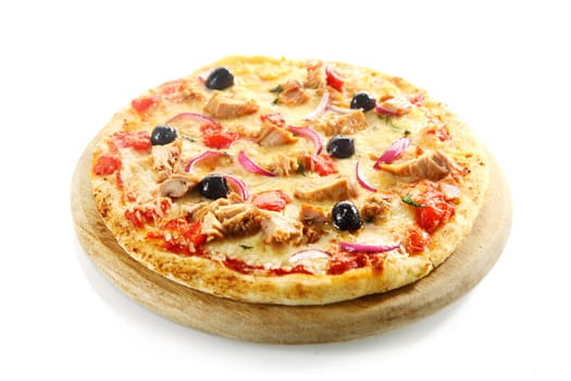 Pizza over a pizza board isolated on white background with tuna fish, onions, olives, cheese and tomato
