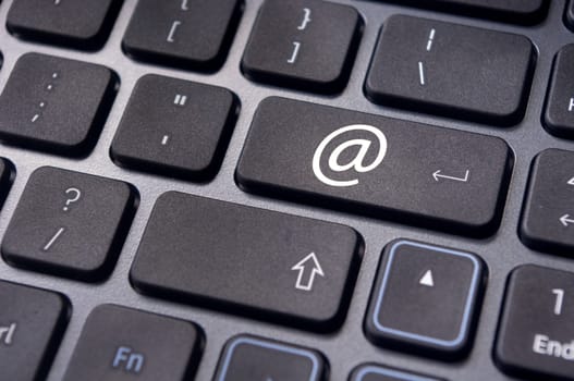 at sign or ampersat on keyboard enter key, for email concepts.