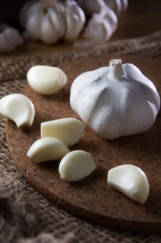 fresh garlic on wooden table