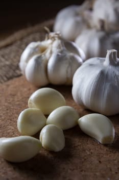 fresh garlic on wooden table