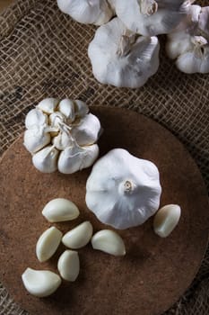 fresh garlic on wooden table