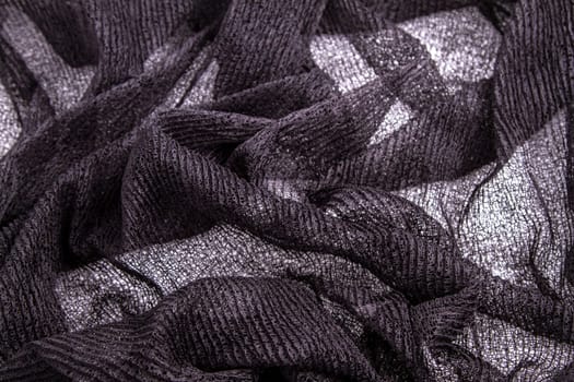 A fancy wrinkled weaved black background.