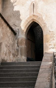 Gothic door at medieval castle in Europe.