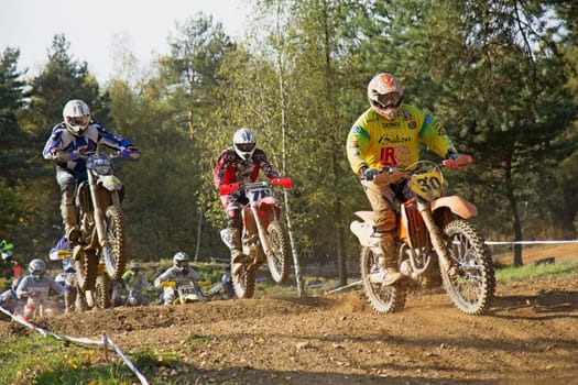 ZABREH, CZECH REPUBLIC - OCT 19.Motocross riders are jumping at Motocross Zabreh Cup on October 19, 2013 in Zabreh, Czech Republic (Central Europe)