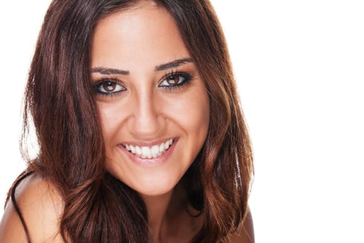 Portrait of a happy young woman against a white background
