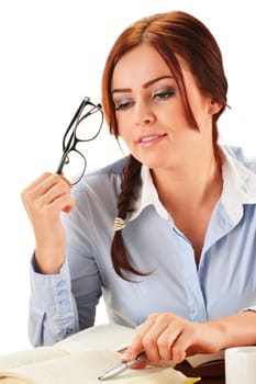 Young woman reading a book. Female student learning.