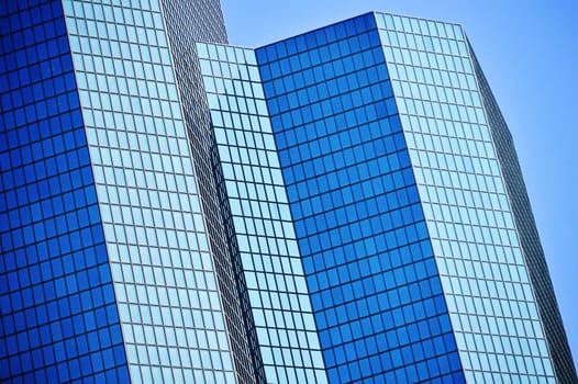 Modern commercial architecture over blue sky