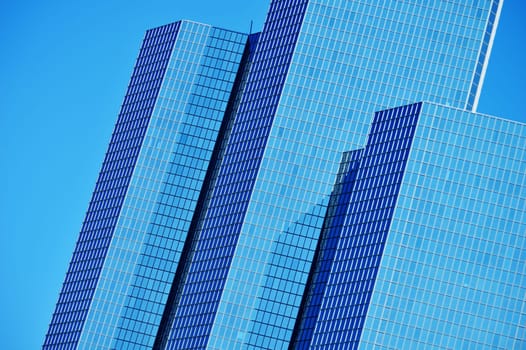 Modern commercial architecture over blue sky