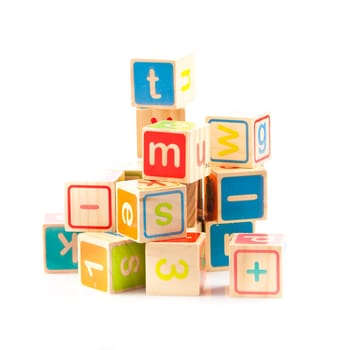 wooden toy cubes with letters. Wooden alphabet blocks.