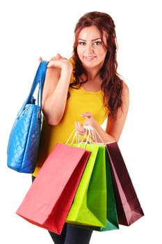 Young woman with shopping bags isolated on white background
