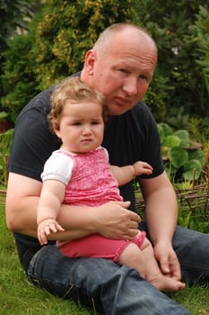 Father comforts girl