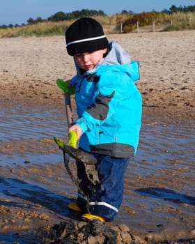 Boy in the mudflats