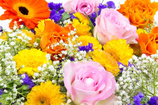 Carpet of roses,statice,veilwort,chrysanthemums,and marigolds