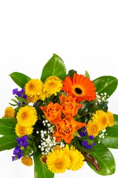 A bouquet of roses,statice,veil herb,chrysanthemums and marigolds