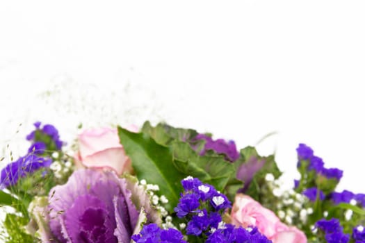A bouquet of roses,statice and veil herb,close-up,front focus