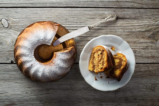 Slices of marble cake sprinkled with sugar