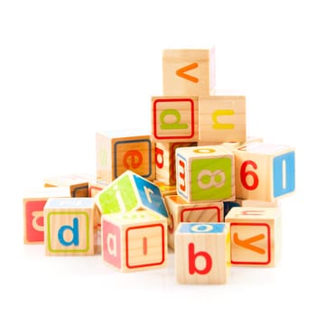 wooden toy cubes with letters. Wooden alphabet blocks.