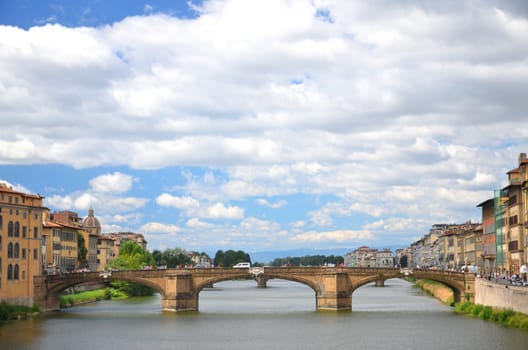 Picturesque view on S.Trinita Bridge over Arno River in Florence, Italy