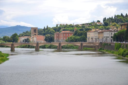 Picturesque view on Bridge alle Grazie over Arno River in Florence, Italy
