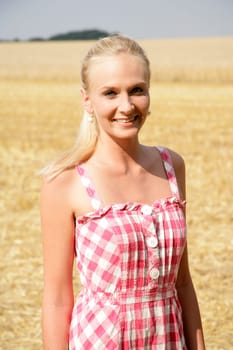 Young woman in the cornfield