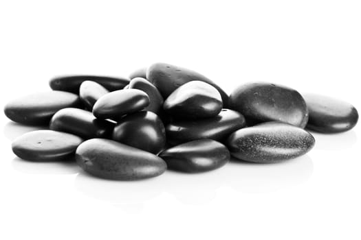 Black massage stones isolated