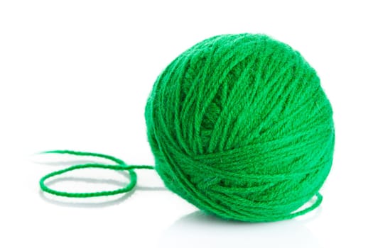 Green wool yarn ball isolated on white