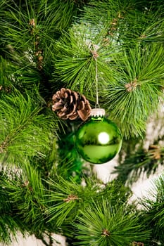 christmas decorations hanging on christmas tree